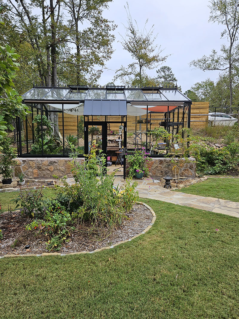 photo one royal victorian greenhouse with owner modifications including awning