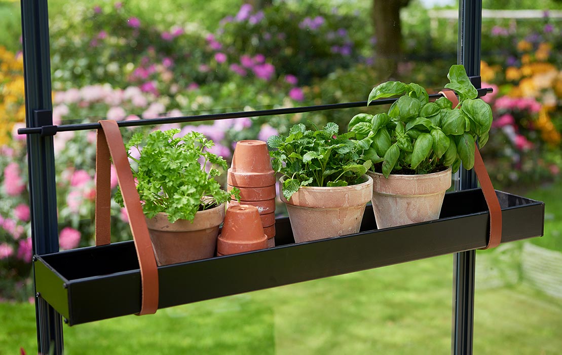 Hanging shelves with leather straps