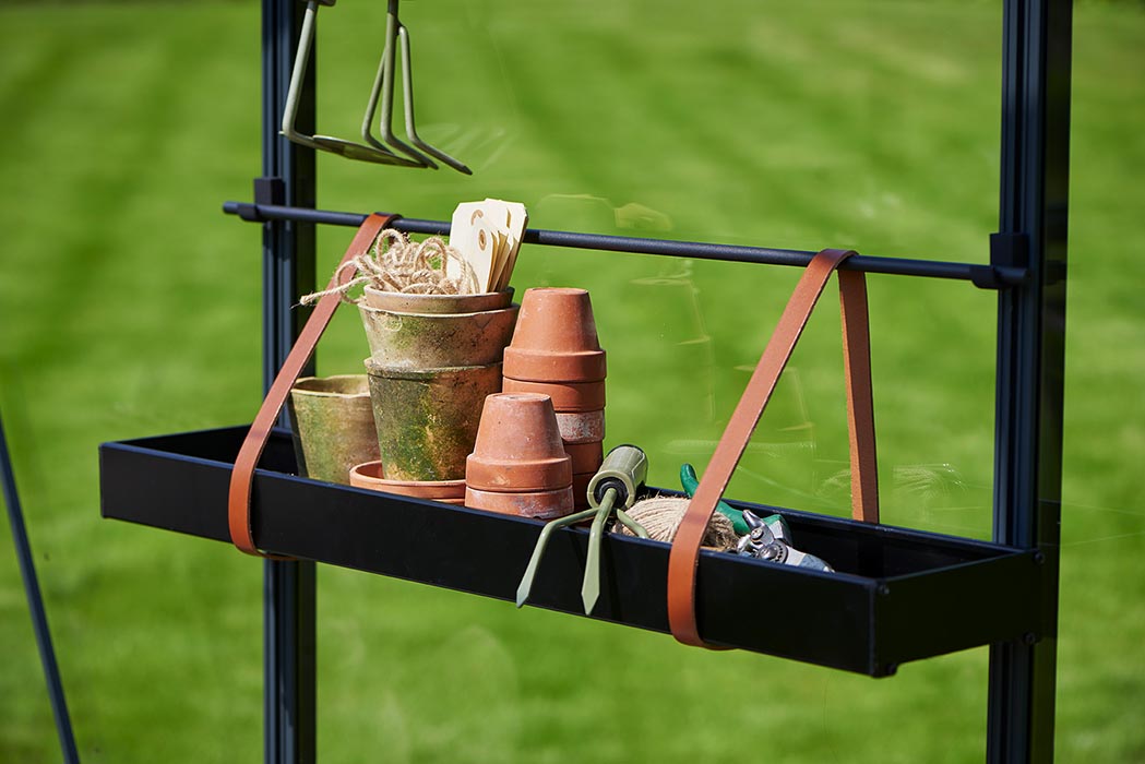 Hanging shelves with leather straps