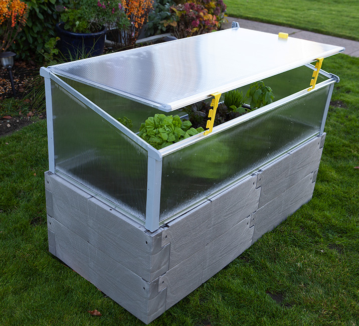 gray timber raised bed with cold frame using openers